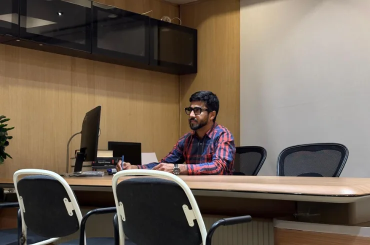Dr. Syed Wesam ul Haq, MD Radiologist, at his consultation desk at HAQ Diagnostics, Mehdipatnam, Hyderabad